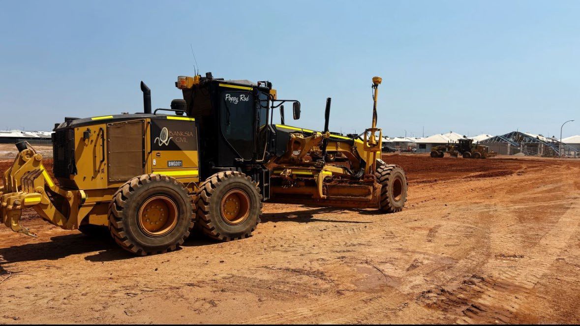 Banksia grader on a red-dirt site